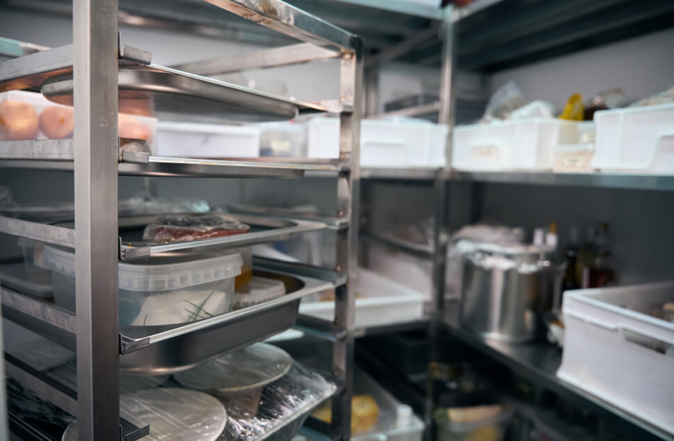 coldfuel stocked refrigerator with various food items and condiments neatly arranged on top