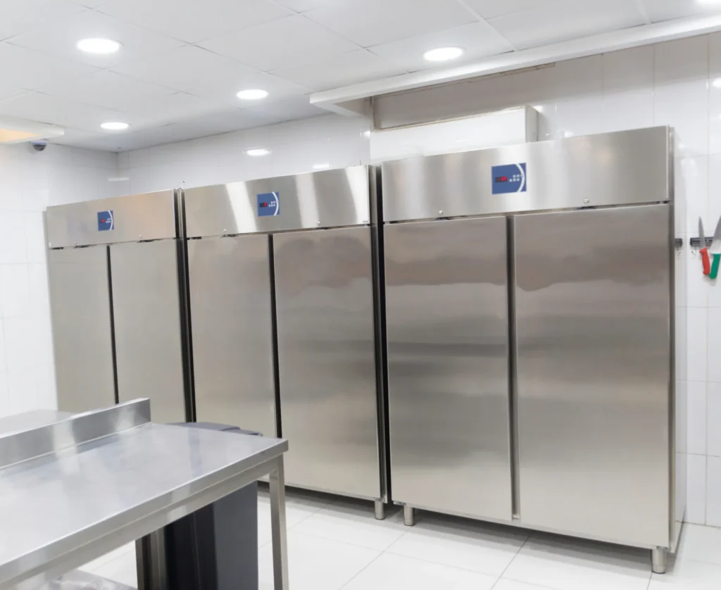 Stainless steel commercial refrigerators in a kitchen